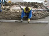 разравнивание цементной стяжки